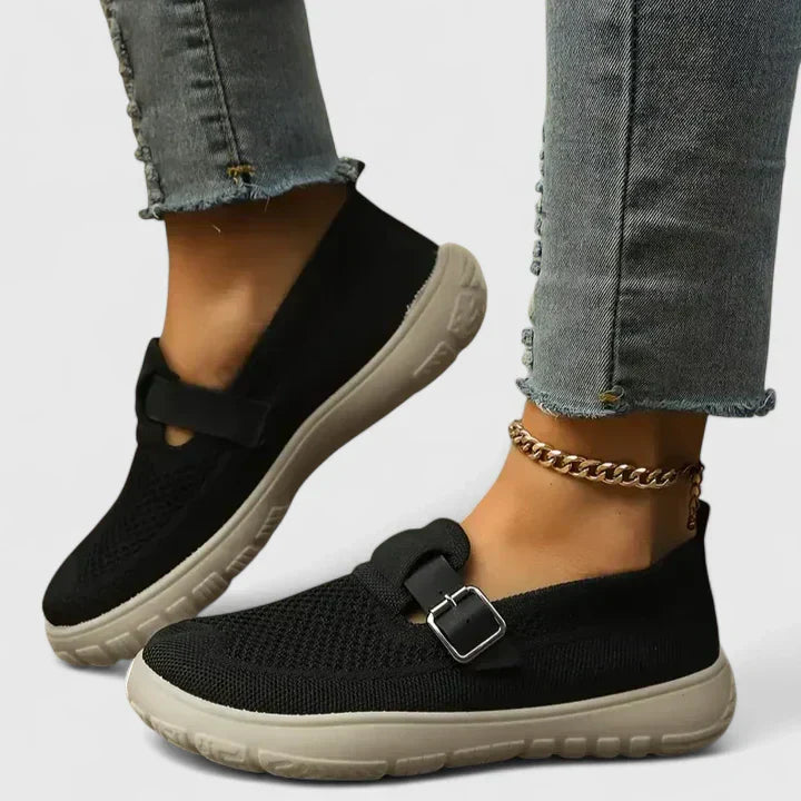 Women's mesh slip-on sneakers in neutral tone with buckle strap detail, lightweight breathable style