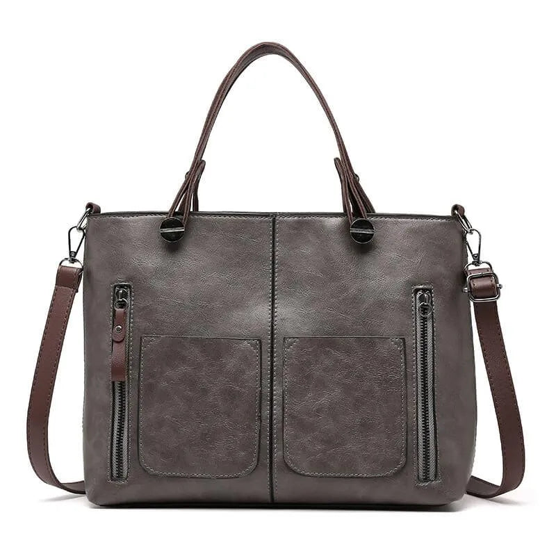 Delilah vegan leather structured tote bag, boxy silhouette with practical exterior pockets