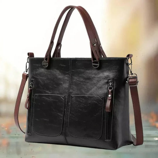 Wavlynn black structured leather bag with polished silhouette and ample organized interior space