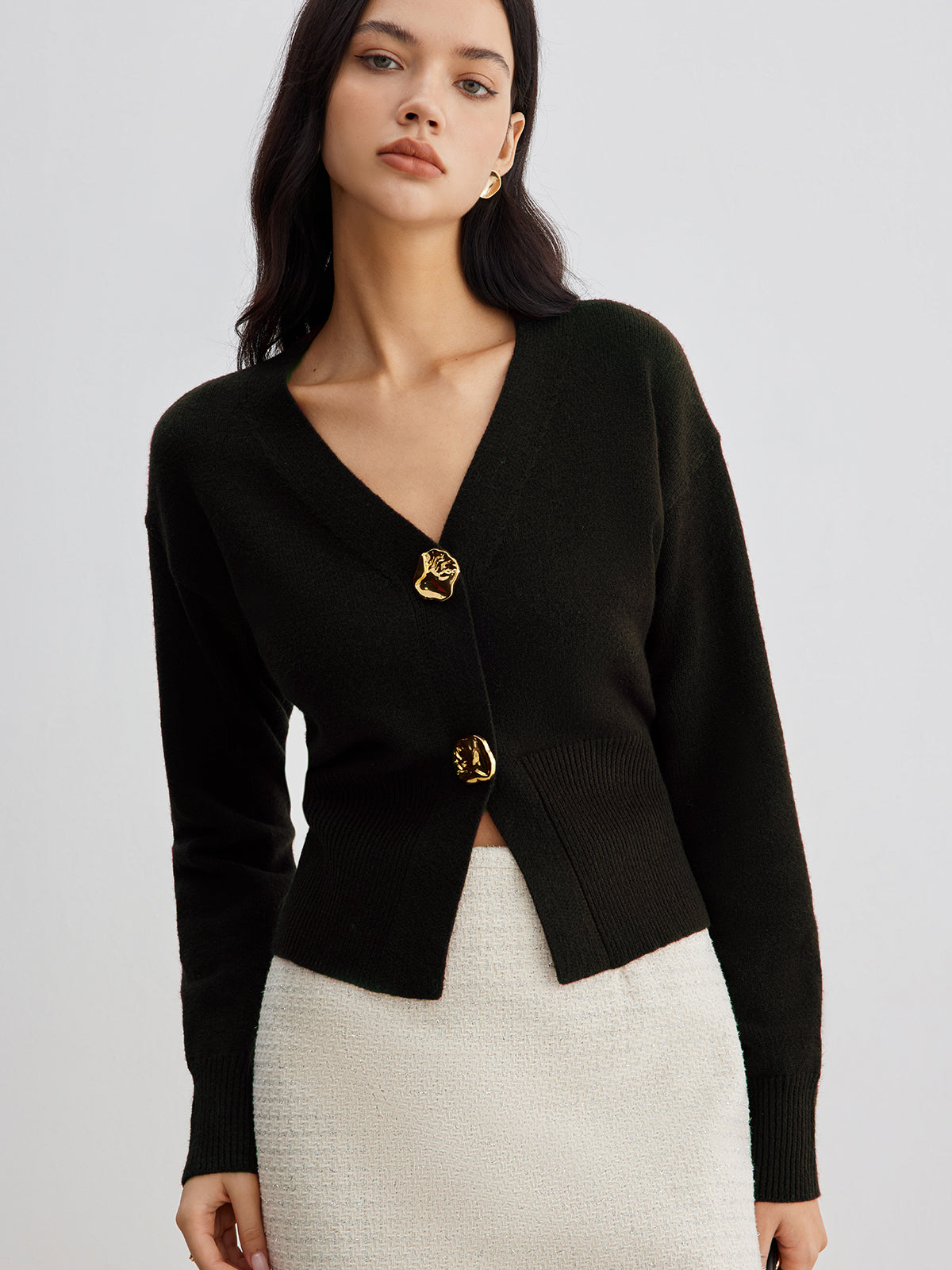 Women's short knit cardigan with elegant metal button detail, casual chic style for work and leisure