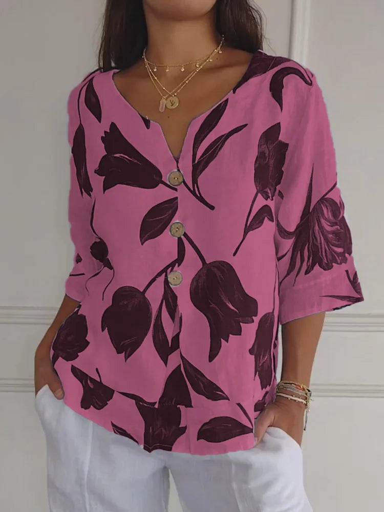 Sanne floral button-up blouse with romantic print, feminine silhouette, and delicate patterned fabric