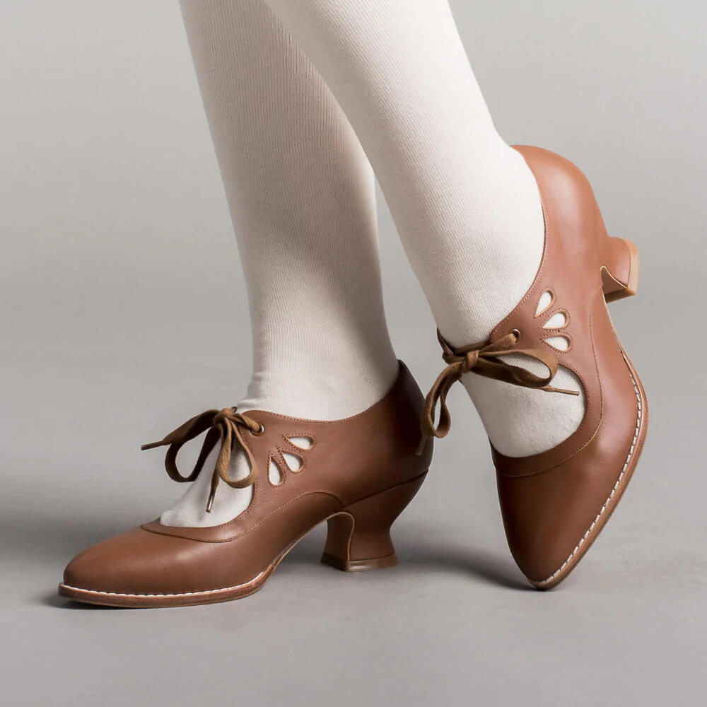 Vintage pin-up stiletto heels with ankle strap in retro silhouette, classic 1950s-inspired design
