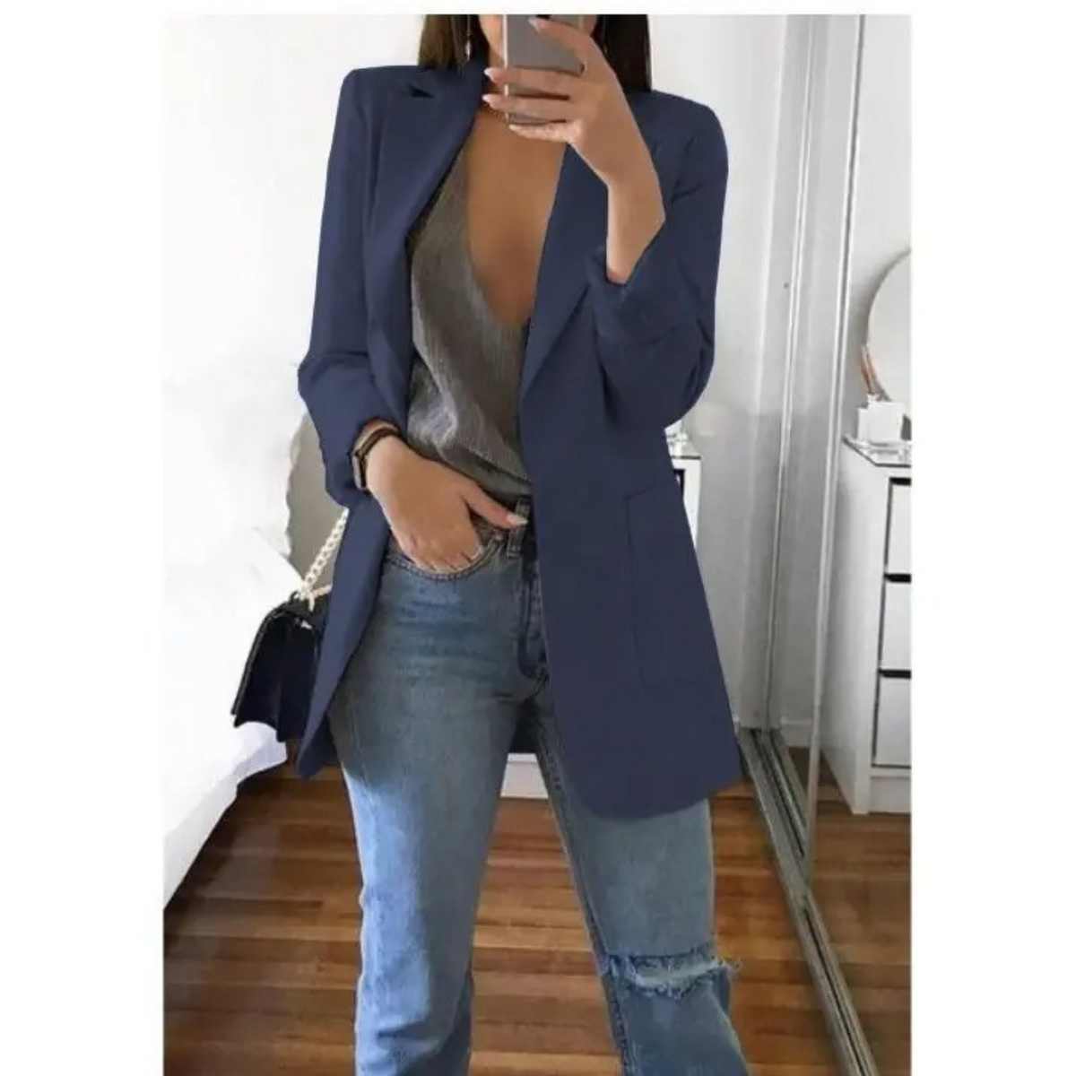 Women's structured single-breasted blazer with notched lapel and welt pockets, tailored professional fit