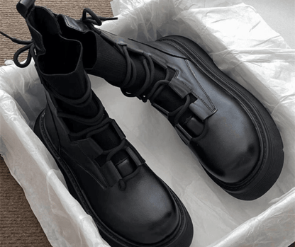 Orion™ elegant winter boots in classic dark tones with premium insulation and refined silhouette