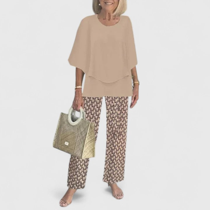 Sage green floral two-piece set with relaxed layered top and botanical print wide-leg pants