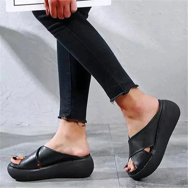 Women's flat cushioned X-strap sandals with elegant crossing strap design for all-day comfort