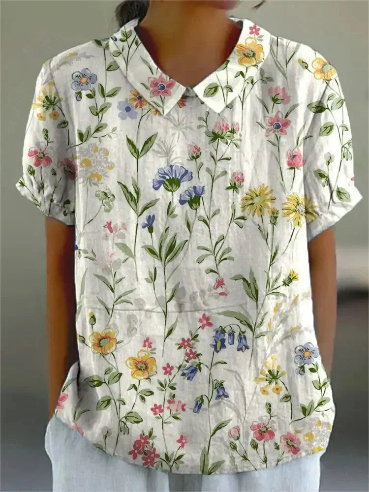Women's relaxed floral shirt in soft multicolor bloom print with lightweight feminine silhouette