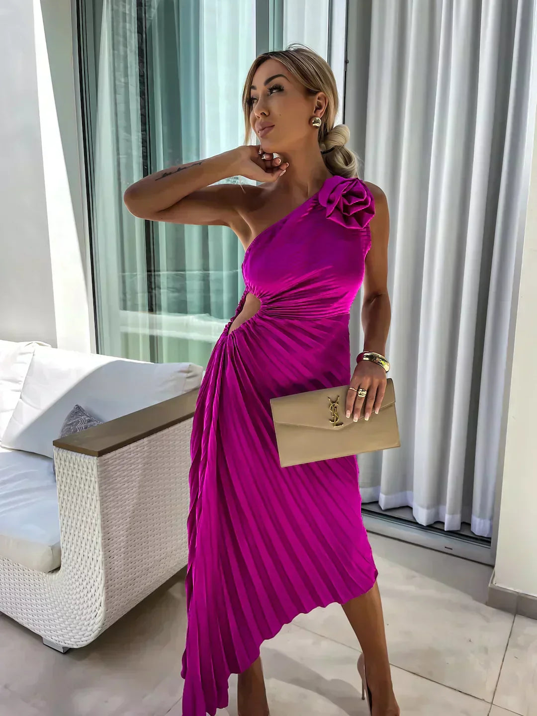 Women's floral garden wedding guest dress in soft romantic print with flowing feminine silhouette