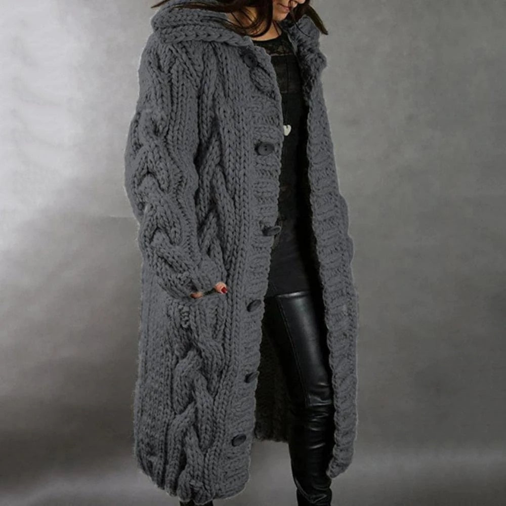 Women's long cable knit cardigan cozy chunky texture warm winter layering piece in neutral tone