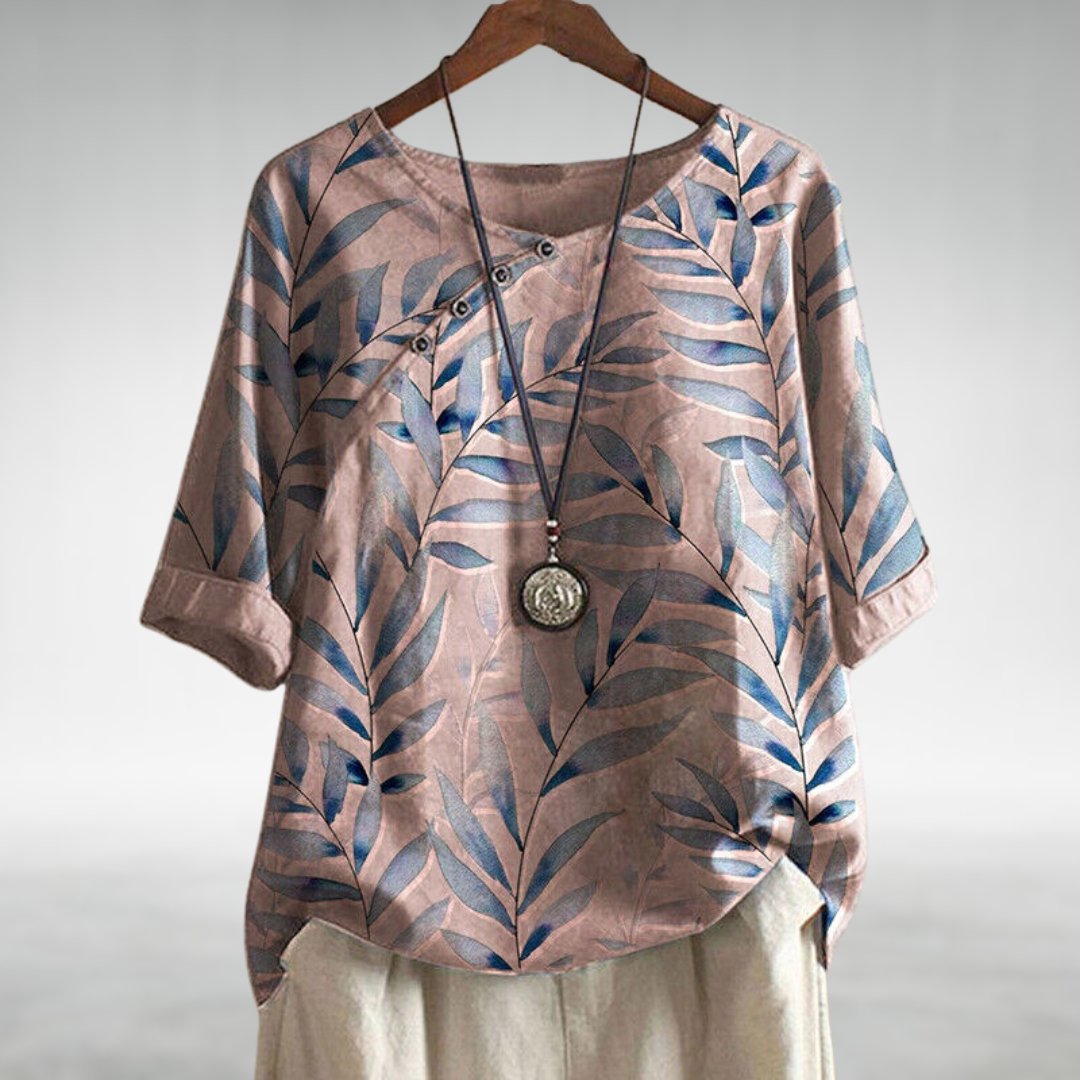 Chic lightweight blouse flattering silhouette soft airy fabric sophisticated casual style unique details