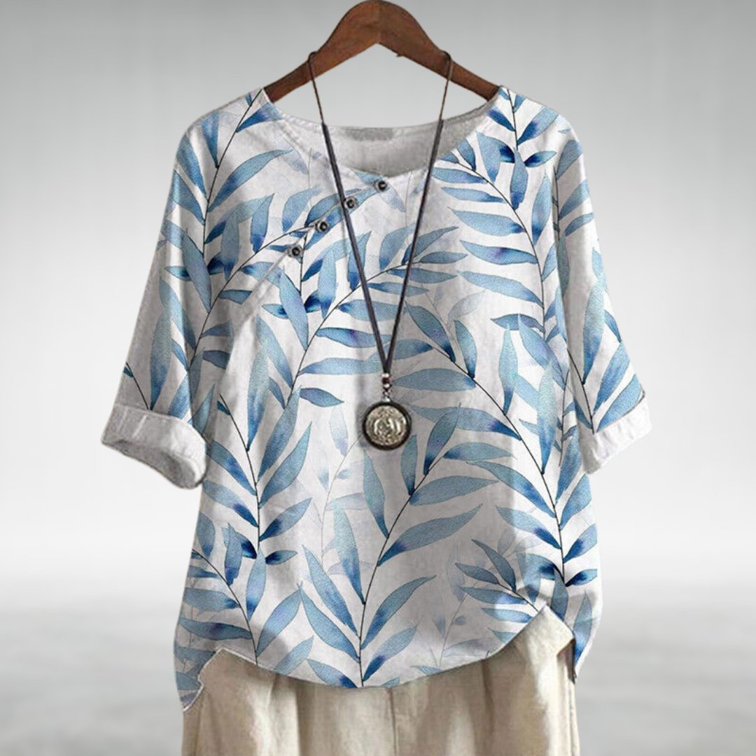 Chic lightweight blouse flattering silhouette soft airy fabric sophisticated casual style unique details