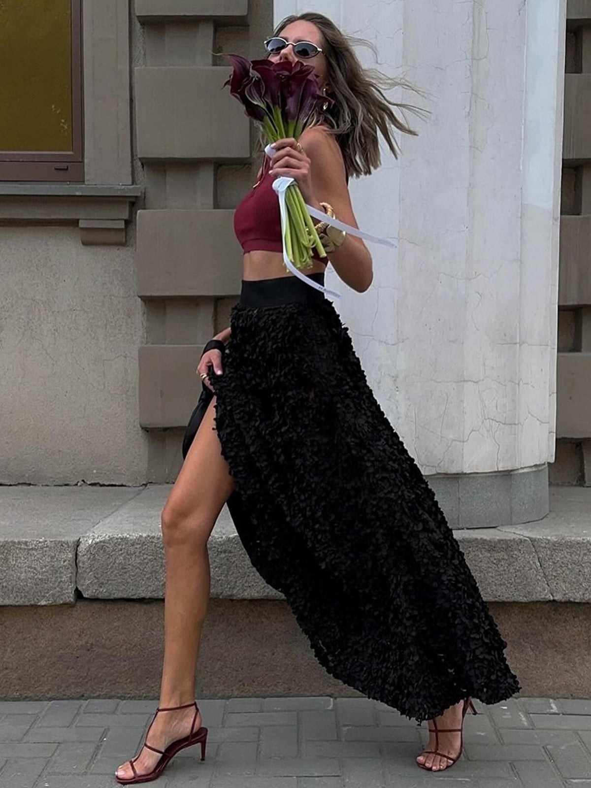 Black high-waist maxi skirt with dimensional rosette jacquard texture, romantic floral silhouette