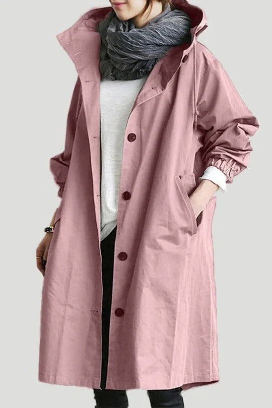 Beige hooded trench coat with sleek modern cut and integrated weather-protective hood