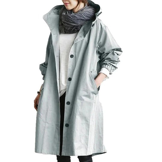 Women's long water-resistant raincoat with full coverage, adjustable drawcord hood, straight silhouette