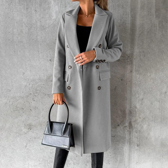 Women's black insulated winter coat with full-body coverage, structured fit, and everyday versatile style