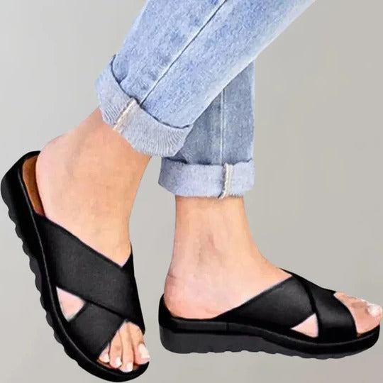 Women's neutral slip-on slippers with simple silhouette, lightweight design for indoor and light outdoor use