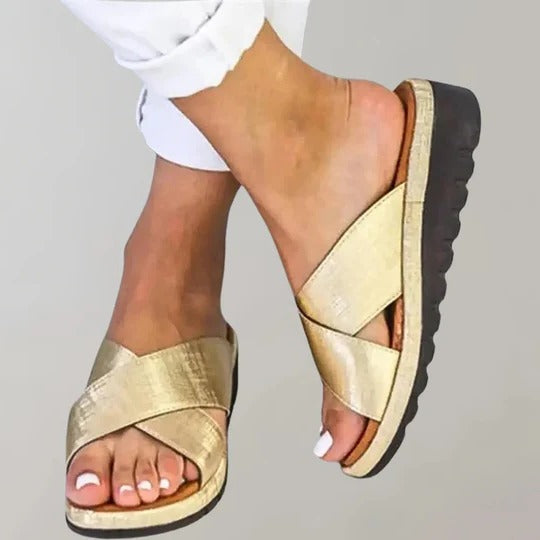 Women's neutral slip-on slippers with simple silhouette, lightweight design for indoor and outdoor casual wear