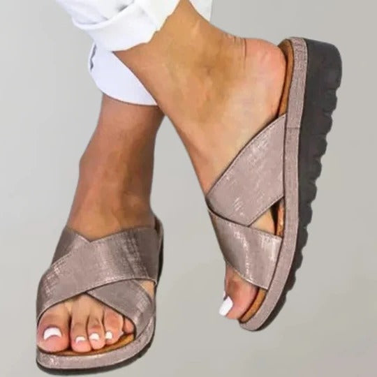Women's neutral slip-on slippers with simple silhouette, lightweight design for indoor and light outdoor wear