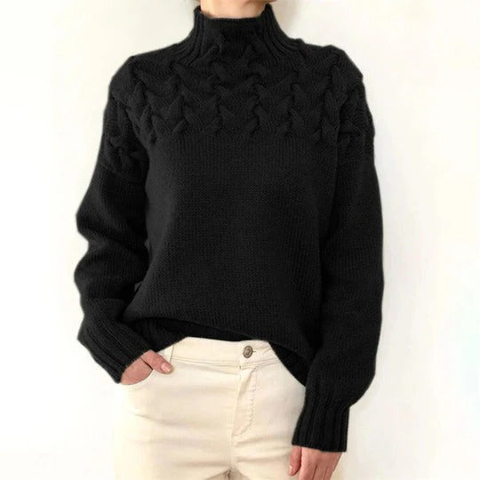 Women's oversized knit turtleneck pullover sweater in extended length for full upper coverage layering