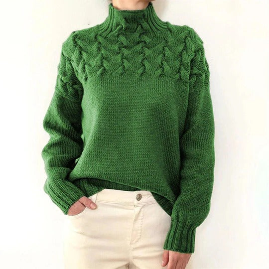 Women's loose knit turtleneck sweater in extended length, tall neck, structured cold-weather layering