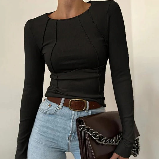 Women's long sleeve straight fit top with subtle piping seam details for everyday wear