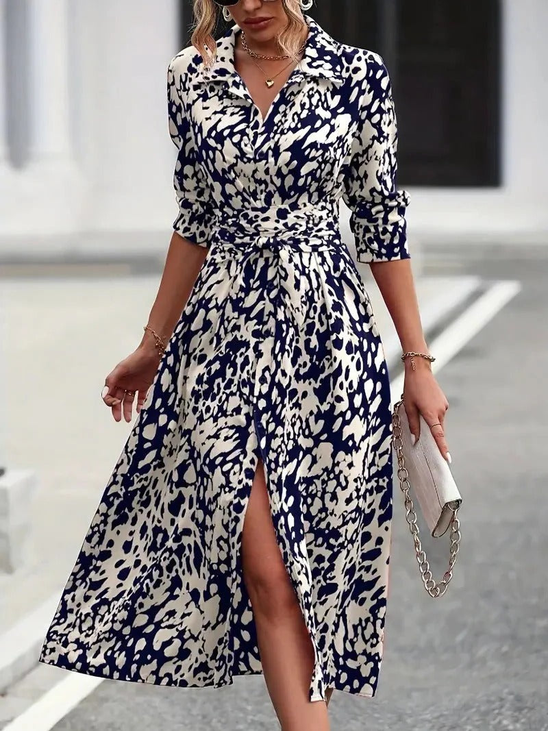 Elegant white A-line midi dress with button-down front and adjustable waist tie for effortless style
