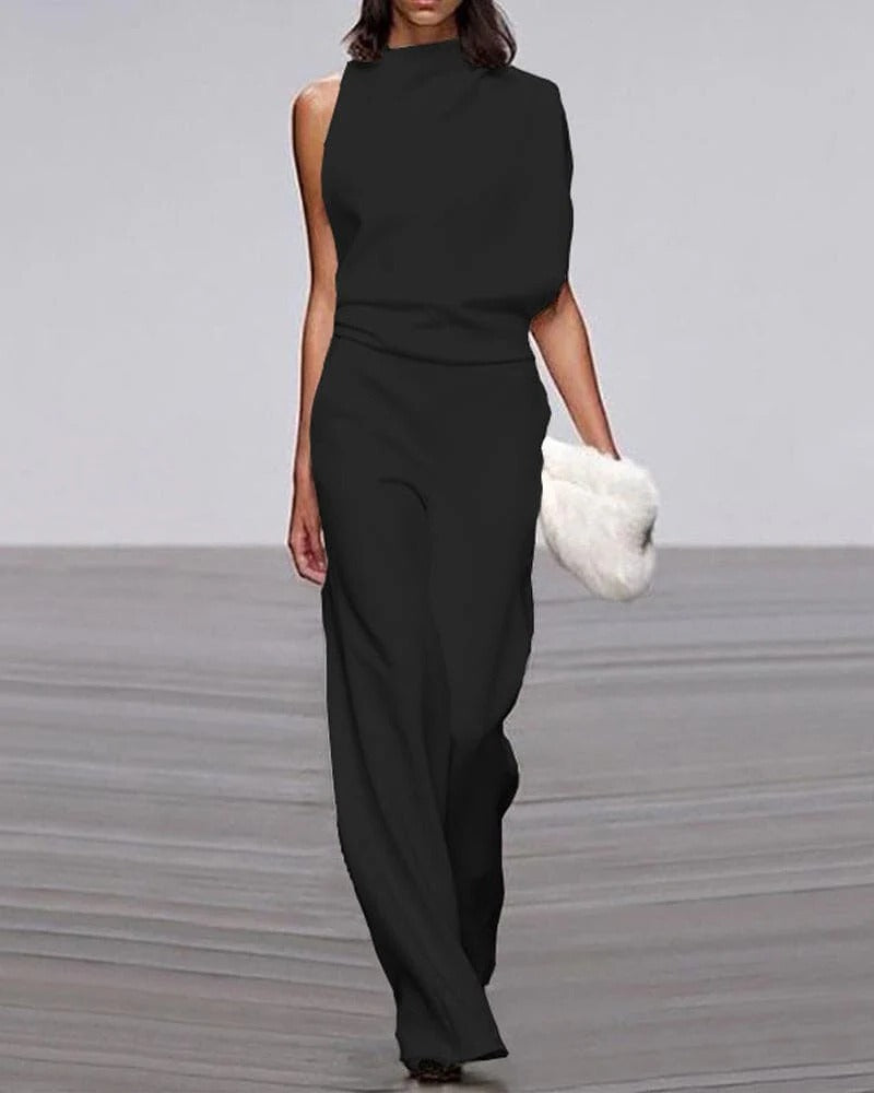 Ivory sleeveless wide leg jumpsuit with mock neck and asymmetric draped shoulder for women