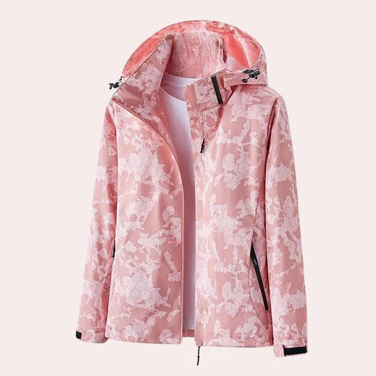 Women's camouflage hooded jacket with detachable hood, functional pockets, and breathable fabric