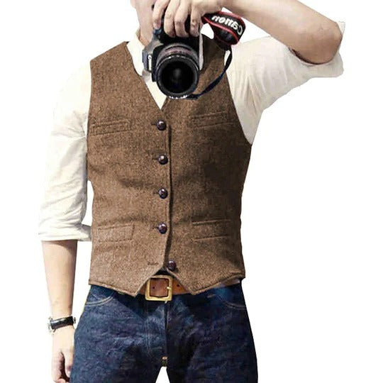 Men's blue denim vest with button closure, sleeveless casual layering style with practical pockets