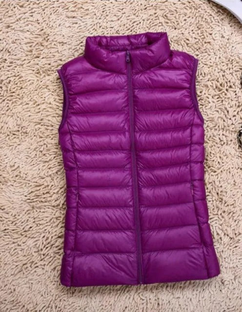 Women's lightweight sleeveless puffer vest, slim fit insulated design for cold weather layering