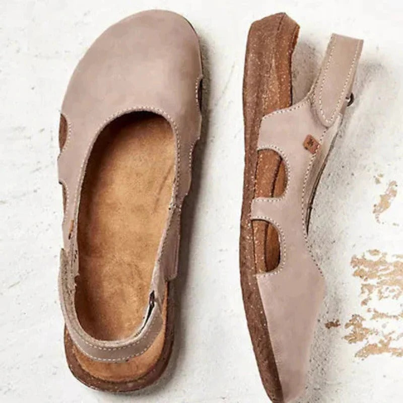 Women's closed-toe sandals with cushioned sole, secure fit, and structured daily wear design