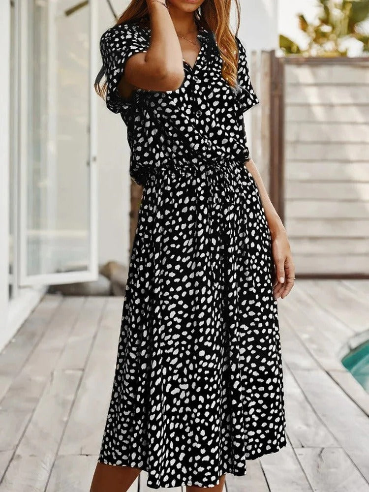 Lightweight midi dress with short sleeves in breathable fabric, casual summer style with flattering mid-length cut