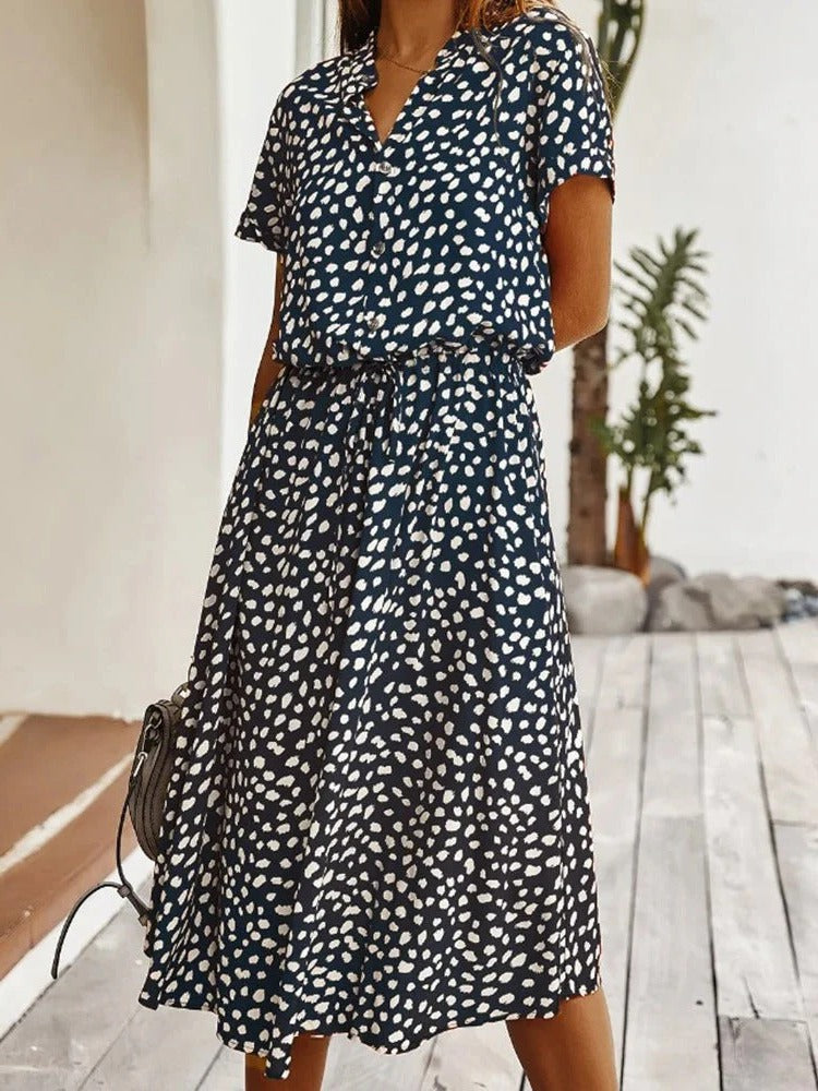 Lightweight midi dress with short sleeves in breathable fabric, casual summer style with flattering mid-length cut
