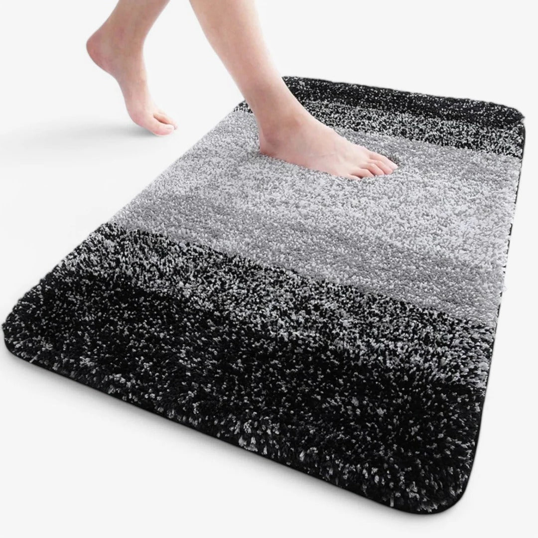 Absorbent slip-resistant bathroom mat for quick drying, ideal for showers and entryways daily use