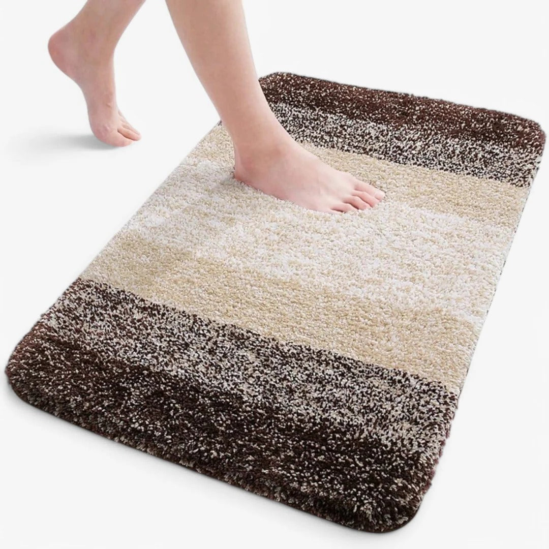 Slip-resistant quick-drying bathroom mat with absorbent surface texture for indoor moisture control