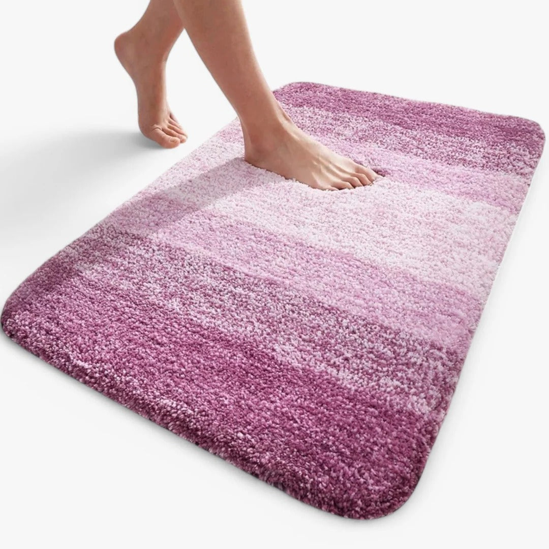 Slip-resistant quick-dry bathroom mat with absorbent surface for shower and bath areas