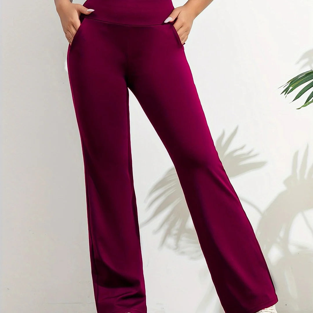 Black flexible yoga pants with adjustable waistband, slim fit design for full range of motion