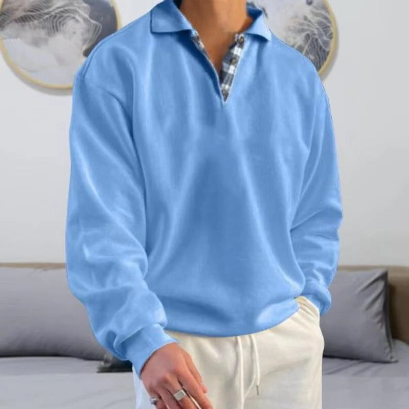 Neutral straight-cut classic pullover with relaxed adaptable fit and versatile layering design