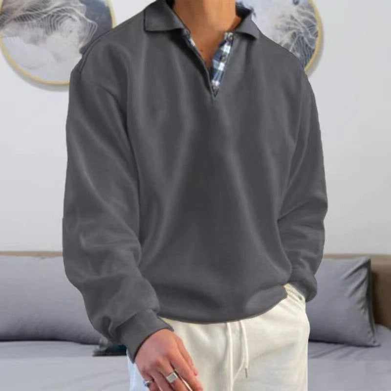 Neutral straight-cut classic pullover with relaxed adaptable fit and versatile layering design