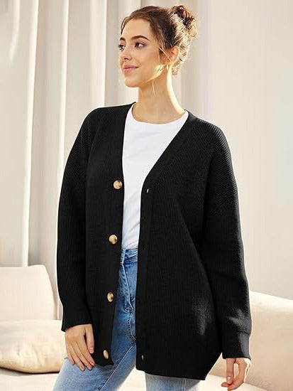 Women's oversized V-neck cardigan with button closure, dropped shoulders, cozy knit layering essential