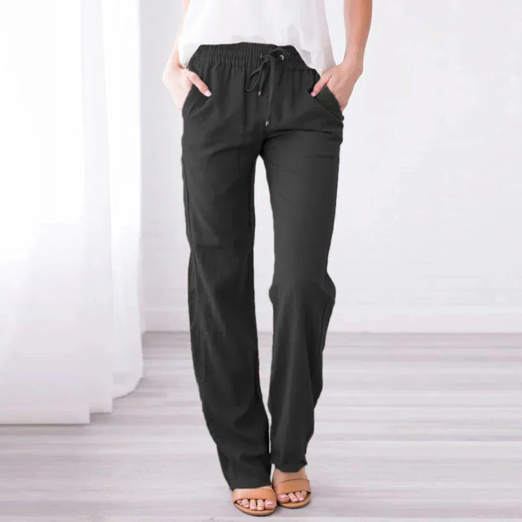Relaxed fit women's trousers in neutral tone with soft fabric and roomy silhouette for all-day comfort