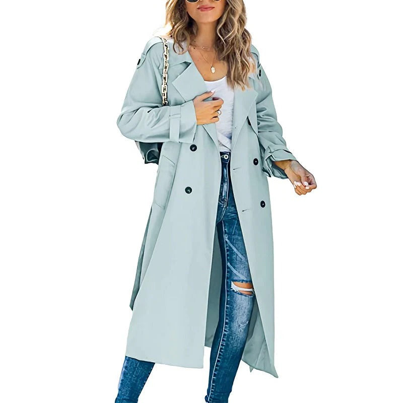 Women's long trench coat in classic neutral tone, slim silhouette with extended length for spring autumn layering