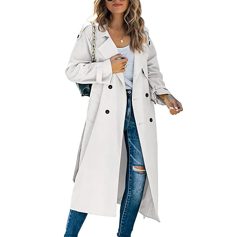 Women's long trench coat chic timeless silhouette in neutral tone for spring autumn transitional wear
