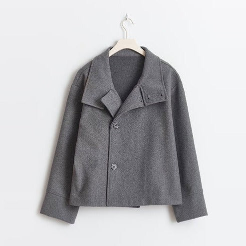 Structured double-breasted short coat hip-length silhouette for casual and office seasonal wear