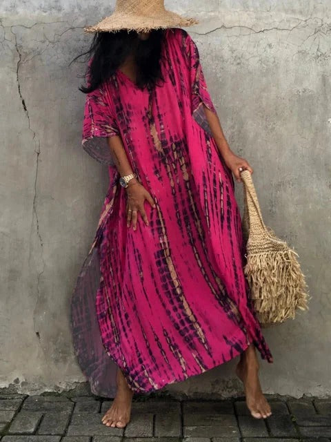 Women's kaftan maxi dress in vibrant print, relaxed plus-size silhouette with airy drape for summer