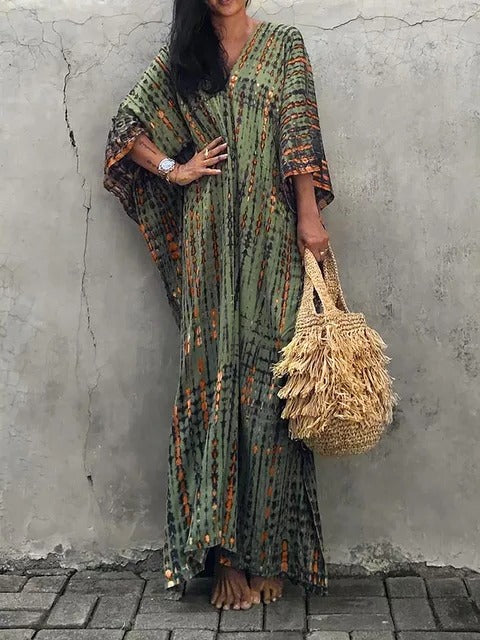 Women's kaftan maxi dress in exotic print, relaxed plus-size silhouette with airy drape for summer