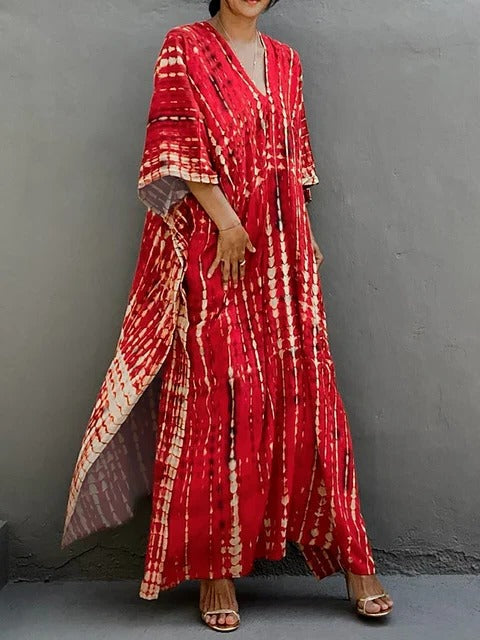 Women's kaftan maxi dress in vibrant print, relaxed plus-size silhouette with airy drape for summer