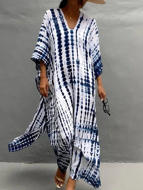 Women's kaftan maxi dress in vibrant print, relaxed silhouette with airy drape, plus-size summer style