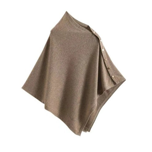 Women's buttoned poncho wrap in neutral tone with elegant front button closure and relaxed silhouette