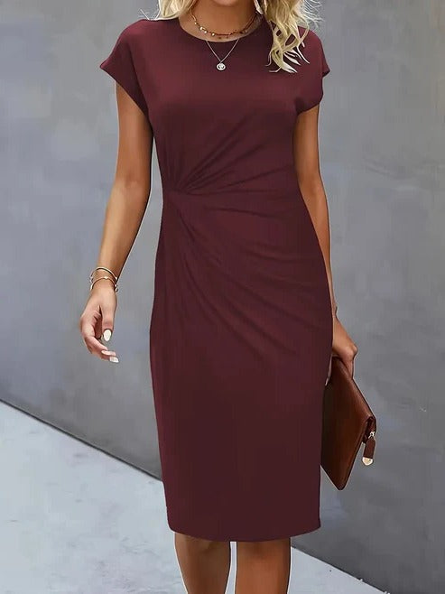 Women's tailored midi dress in classic silhouette with round neckline, lightweight professional style